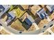 Overhead view of homes with fenced yards, green spaces, and solar panels in a residential neighborhood at 1020 Broadlands Way, Graham, NC 27253