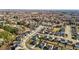 Expansive aerial view of a well-planned neighborhood with modern homes and lush greenery at 1020 Broadlands Way, Graham, NC 27253