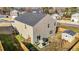 Aerial view of backyard featuring fenced-in yard, patio, outdoor kitchen, storage shed and more at 1020 Broadlands Way, Graham, NC 27253