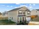 Beautiful two-story home with a well-maintained lawn, attached garage, and inviting front porch at 1020 Broadlands Way, Graham, NC 27253