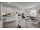 Modern kitchen with stainless steel appliances and a dining area at 1020 Broadlands Way, Graham, NC 27253