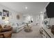 Well-lit living room with comfortable seating and a TV at 1020 Broadlands Way, Graham, NC 27253