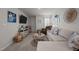 Living room with neutral paint and furnishings, carpeted floor, and a TV at 1020 Broadlands Way, Graham, NC 27253