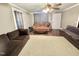 Open living area with ceiling fan and lots of space for entertaining at 1043 Cavel Chub Lake Rd, Roxboro, NC 27574