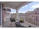 Cozy balcony space with contemporary furniture and scenic neighborhood views at 10510 Sablewood Dr # 114, Raleigh, NC 27617