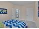 Comfortable bedroom featuring neutral walls and carpet, with access to a bathroom and closet at 10510 Sablewood Dr # 114, Raleigh, NC 27617