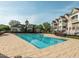 Large community pool with tanning area and nearby clubhouse provides residents with a luxurious outdoor experience at 10510 Sablewood Dr # 114, Raleigh, NC 27617