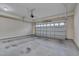 Spacious garage with a functional overhead door and ample room for vehicles and storage at 10510 Sablewood Dr # 114, Raleigh, NC 27617
