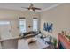 A view from above showcases the living room with the fireplace, lots of light, and hardwood floors at 10510 Sablewood Dr # 114, Raleigh, NC 27617