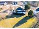 Expansive backyard with lush green grass surrounding a beautiful two-story home in a peaceful neighborhood at 10620 Staghound Trl, Zebulon, NC 27597