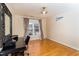 Versatile bedroom featuring hardwood floors, lots of natural light, and space for a desk area at 10620 Staghound Trl, Zebulon, NC 27597