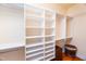 Well-organized walk-in closet featuring custom shelving, ample hanging space, and stylish decor at 10620 Staghound Trl, Zebulon, NC 27597