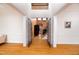 Inviting foyer with hardwood floors and ornate iron gates leading to the main area at 10620 Staghound Trl, Zebulon, NC 27597