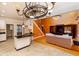 Open-concept living space seamlessly connects the kitchen, living room, and staircase at 10620 Staghound Trl, Zebulon, NC 27597