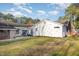 Lush backyard featuring a covered patio, gazebo, and well-manicured lawn, offering ample outdoor living space at 1107 S 2Nd St, Smithfield, NC 27577