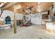 Spacious garage with an overhead ceiling fan offering ample room for parking and storage solutions at 1107 S 2Nd St, Smithfield, NC 27577