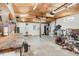Large garage space equipped with storage, lighting, and space for working on projects at 1107 S 2Nd St, Smithfield, NC 27577