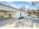 Spacious detached garage with a covered area, a workshop, and ample parking space at 1107 S 2Nd St, Smithfield, NC 27577