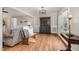 Bright living room with hardwood floors, accent furniture and a hutch that enhances the home's charm at 1107 S 2Nd St, Smithfield, NC 27577