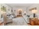 Elegant living room featuring hardwood floors, comfortable seating, and a large window for natural light at 1107 S 2Nd St, Smithfield, NC 27577