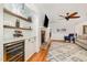 Cozy living area features a brick fireplace and a custom built-in wine and beverage center at 1107 S 2Nd St, Smithfield, NC 27577