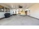 Covered patio area with outdoor seating, ceiling fan, and a view of the backyard at 1107 S 2Nd St, Smithfield, NC 27577