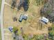 Aerial view of the house, barn, and dog area at 1304 Nc 96 Hwy S, Zebulon, NC 27597