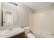 Bathroom with single sink vanity, bath tub, and white walls at 1304 Nc 96 Hwy S, Zebulon, NC 27597