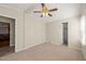 Bedroom with neutral colored walls, closet, and a ceiling fan at 1304 Nc 96 Hwy S, Zebulon, NC 27597