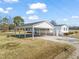 Exterior view of carport showcasing the support beams and covered parking at 1304 Nc 96 Hwy S, Zebulon, NC 27597