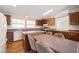Bright kitchen with island table and wood cabinets at 1304 Nc 96 Hwy S, Zebulon, NC 27597