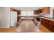 Kitchen with a spacious island and dining area with natural light at 1304 Nc 96 Hwy S, Zebulon, NC 27597