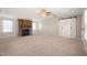 Spacious living room with fireplace featuring a stone surround and exposed brick accents at 1304 Nc 96 Hwy S, Zebulon, NC 27597
