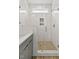 Stylish bathroom featuring a glass enclosed shower, white subway tile, and updated modern fixtures at 136 E End Ave # 4, Durham, NC 27703