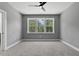 Bedroom with three large windows that let in ample natural light at 140 E End Ave # 2, Durham, NC 27703