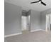 Spacious bedroom features neutral walls and carpeted floor at 140 E End Ave # 2, Durham, NC 27703