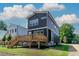 An impressive view of the rear exterior elevation of this modern home at 140 E End Ave # 2, Durham, NC 27703
