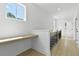 Upstairs hallway features a built-in desk and modern railing at 140 E End Ave # 2, Durham, NC 27703