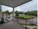 Enjoy outdoor living from the private balcony overlooking a landscaped green space at 1400 Gathering Park Cir # 202, Cary, NC 27519