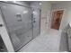 Bathroom with a glass-enclosed shower and modern finishes at 1400 Gathering Park Cir # 202, Cary, NC 27519