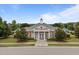Charming community clubhouse with manicured landscaping and classic architectural details at 1400 Gathering Park Cir # 202, Cary, NC 27519