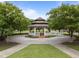 Charming gazebo, surrounded by lush trees and greenery, is the perfect outdoor venue for community gatherings at 1400 Gathering Park Cir # 202, Cary, NC 27519