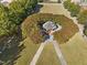Aerial view of gazebo surrounded by green space and walkways in this charming neighborhood at 1400 Gathering Park Cir # 202, Cary, NC 27519