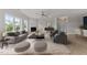 Inviting living room featuring neutral tones, stylish furniture, fireplace and abundant natural light at 1400 Gathering Park Cir # 202, Cary, NC 27519