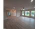 Bright living room features recessed lighting, hardwood floors, and lots of windows at 1400 Gathering Park Cir # 202, Cary, NC 27519