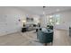 Well-lit common area with modern furniture, decor, and stylish accents at 1400 Gathering Park Cir # 202, Cary, NC 27519