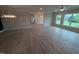 Large open living area featuring hardwood floors, recessed lighting, and modern fixtures at 1400 Gathering Park Cir # 202, Cary, NC 27519