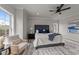 Tranquil main bedroom showcasing a plush bed, seating area, and a bright airy atmosphere at 1400 Gathering Park Cir # 202, Cary, NC 27519