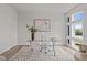 Contemporary office space with a glass desk, neutral rug, and bright natural light at 1400 Gathering Park Cir # 202, Cary, NC 27519