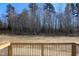 A view of the wooded backyard from the new deck at 1415 Reading Ct # 77Kl, Burlington, NC 27217